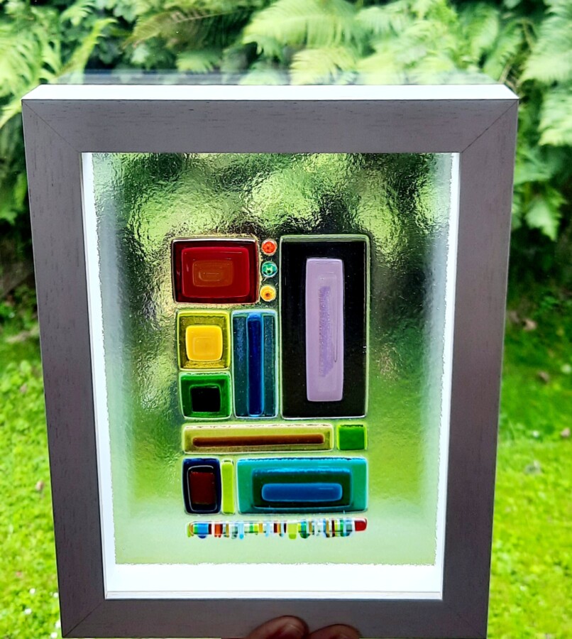 Framed fused glass panel